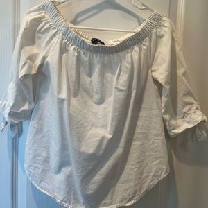 White blouse off the shoulders